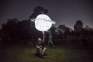 Reaching for Saturn at the Illuminares Lantern Festival- Its all about the light